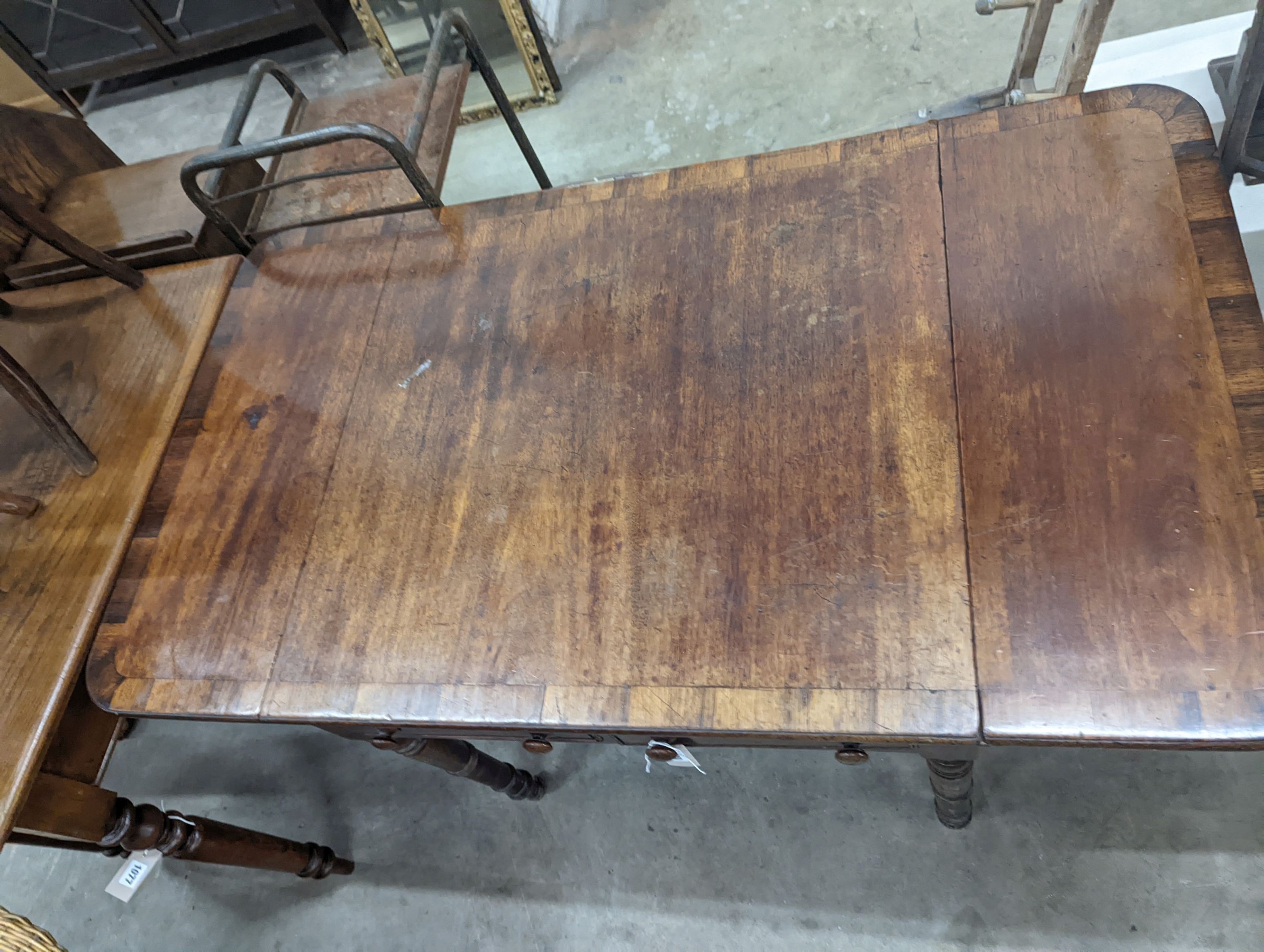 A Regency rosewood banded mahogany sofa table, 128cm extended, depth 75cm, height 73cm